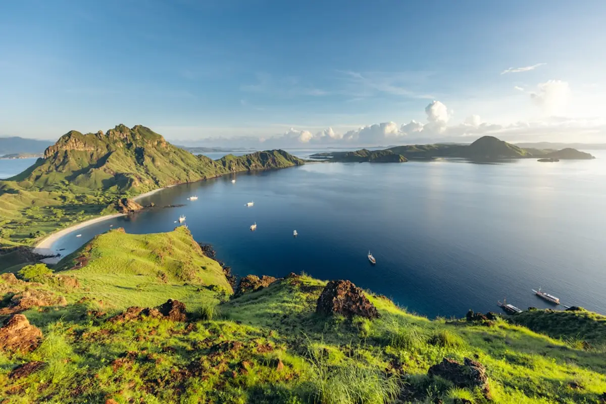 Speedboat cutting across calm Komodo waters